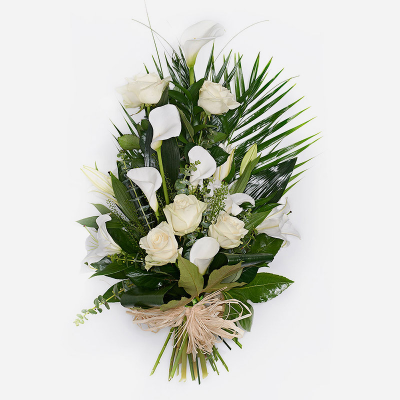 White Tied Sheaf - White flowers and foliage. An ideal presentation bouquet to be sent to a funeral. In whites this bouquet is suitable for a man or a lady.